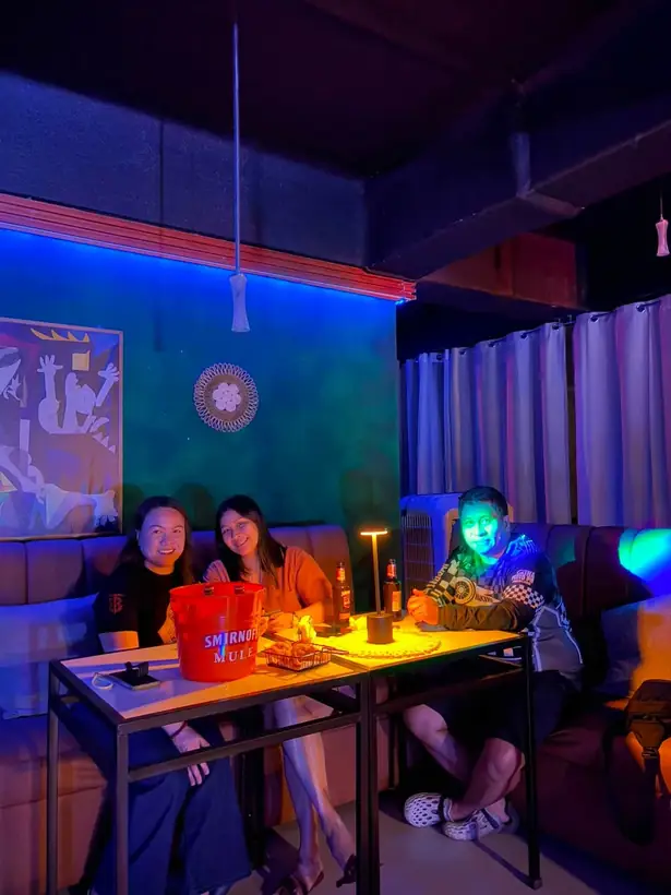 Friends enjoying an evening together at Harong ni Kadunong